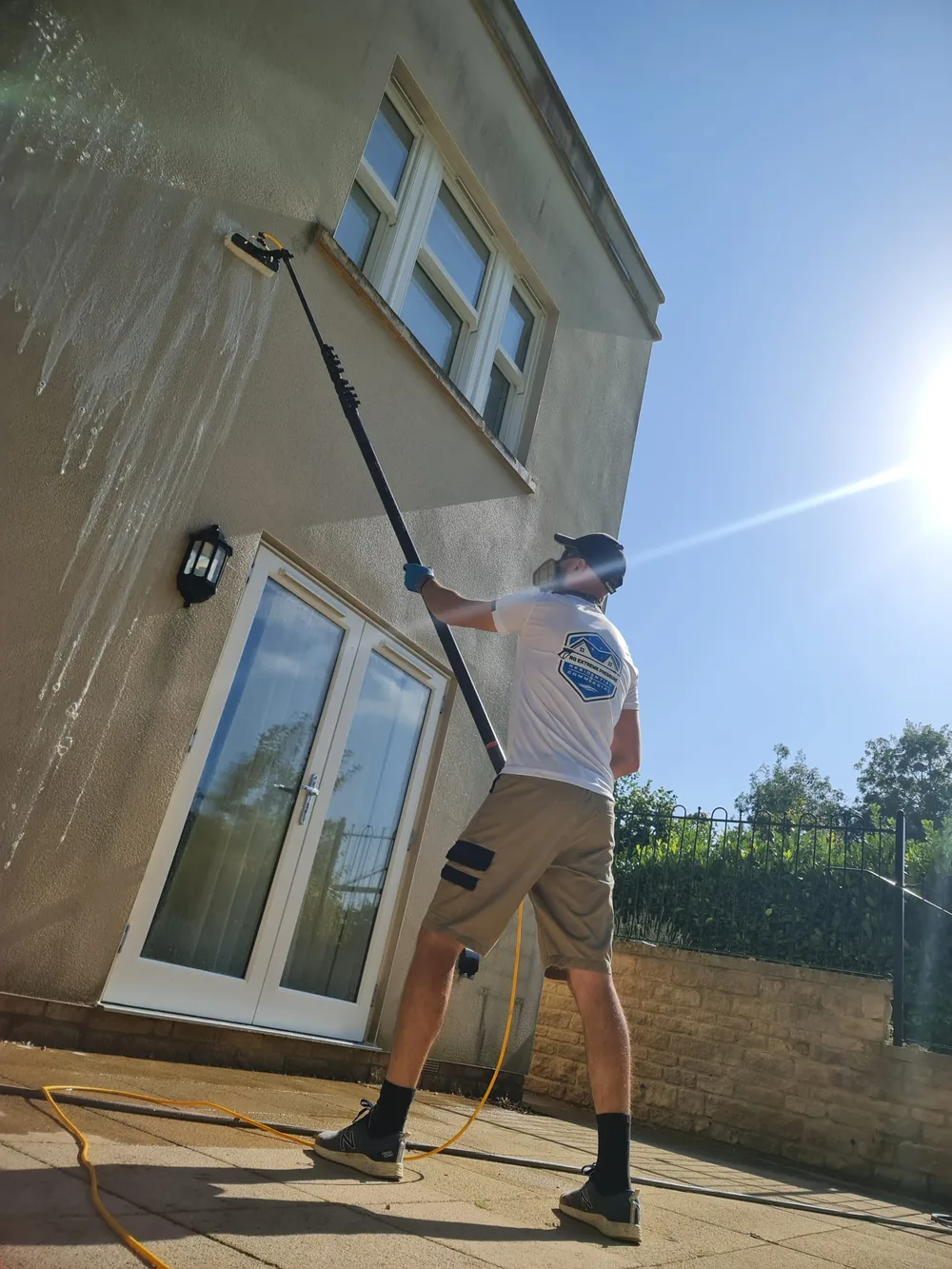 Soft wash render cleaning in action at a Bristol property